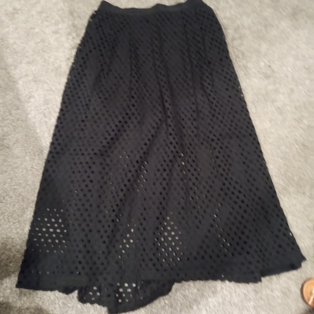 Mid length black skirt